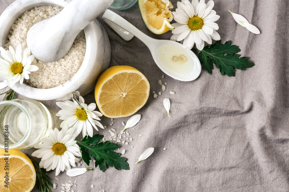 Natural cosmetic ingredients on fabric background