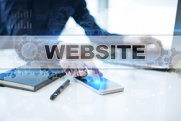 Wall Mural - Businessman working in office, pressing button on virtual screen and selecting website.
