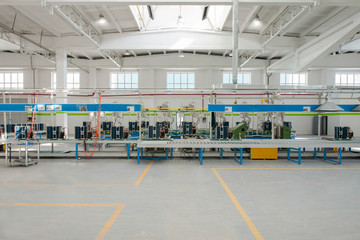 Wall Mural - factory floor for production and assembly of household air conditioners on the conveyor belt