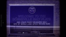 1980: Sign:welcome To The Bonneville Salt Flats; Trucks With Camping Trailers WESTERN USA