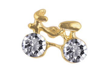 Close-up of funny golden earrings bicycle-shaped with two diamonds, isolated on white background, clipping path included