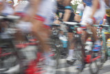 Fototapeta  - Racing Cyclists, Motion Blur