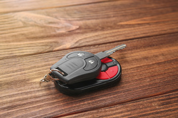 Wall Mural - Car key on wooden table