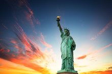 New York City, The Statue Of Liberty In A Colorful Sunset