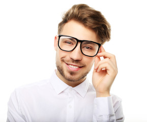 Poster -  Young  trendy man with glasses smiling, studio shot