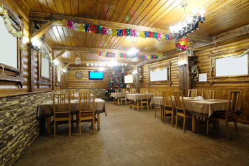 Wall Mural - Interior of a cafe in a wooden house