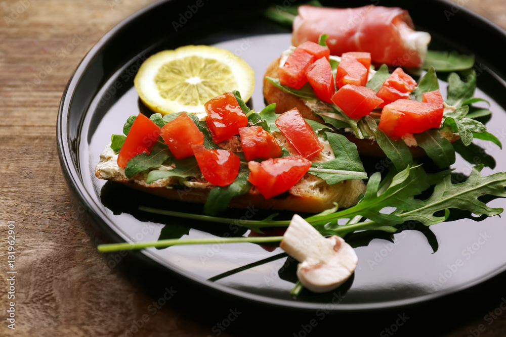 Delicious bruschetta on tray