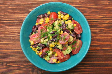 Wall Mural - Black bean salad with avocado, corn and tomato. healthy food concept