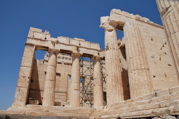 Stone columns by the entrance steps to the historic Acropolis of Athens in Greece. Dating from the fifth century BC, it is one of the top tourist attractions in the World.