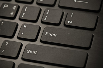 Fototapete - Black keyboard computer to enter key 