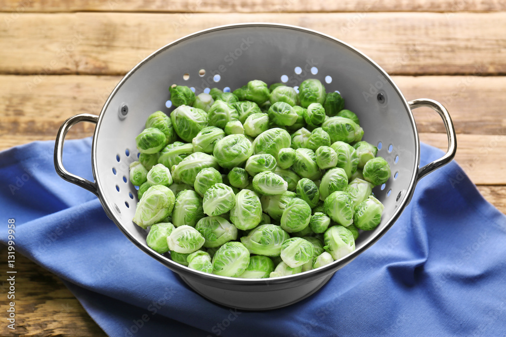 Brussels sprouts in colander on napkin