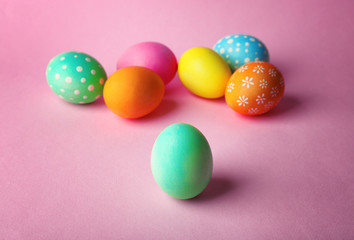 Wall Mural - Colorful Easter eggs on pink background