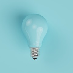 Wall Mural - blue pastel light bulb on blue pastel background. minimal concept. top view.