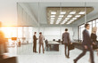 © ImageFlow - Company employees at their workplace