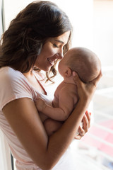 Wall Mural - woman with newborn baby