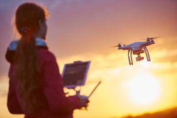 Wall Mural - drone flying at sunset
