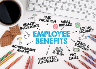 Employee Benefits Concept. Computer keyboard, pencils and coffee with cookies on the table.