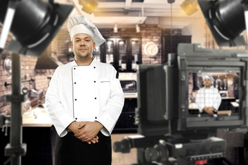 Wall Mural - cook chef in tv studio 