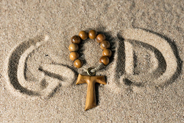 Wall Mural - God - Written on Sand with Cross