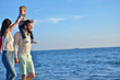 © FS-Stock - happy young family have fun on beach run and jump at sunset