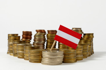 Austria flag waving with stack of money coins