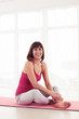 © ArtFamily - Smiling charming woman resting after yoga workout