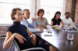 © Monkey Business - Businesspeople Listening To Presentation In Boardroom