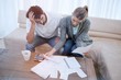 © vectorfusionart - Depressed couple doing their accounting