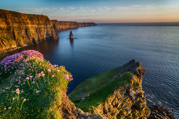 ireland countryside tourist attraction in county clare. the cliffs of moher and castle ireland. epic