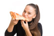 Young woman eat pizza isolated on a white background.