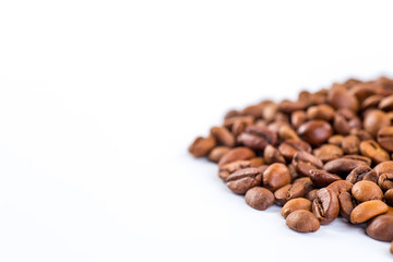 Wall Mural - Coffee beans with white background for copy space.