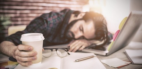 Poster - Tired creative editor holding disposable cup