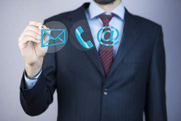 Canvas Print - Businessman in his office using digital interface