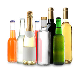 Poster - Bottles with different drinks on white background