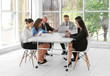 © Africa Studio - Business training concept. Colleagues at an office meeting
