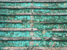 Ribs Of Old Wooden Rowboat With Green Paint