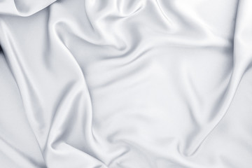 Close up wave white silk or satin fabric background