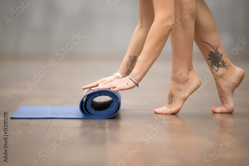 Attractive Young Woman With Beautiful Tattoo On Her Foot Meaning Wild Kitty Folding Blue Yoga Or