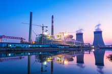 Modern Waterfront Power Plant At Sunset
