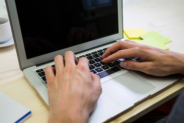 Aufkleber - Graphic designer using digital tablet at his desk