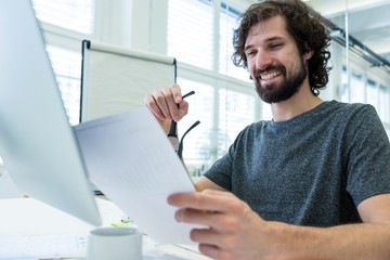 Aufkleber - Graphic designer working at his desk