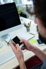 Aufkleber - Business executive looking at clipboard at his desk