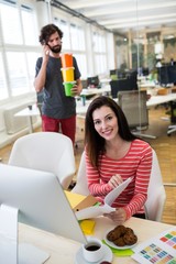 Aufkleber - Female graphic designer sitting at desk