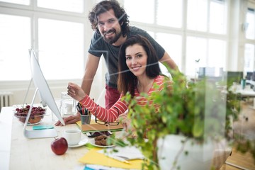 Aufkleber - Graphic designers working over computer