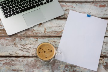 Poster - Laptop with blank paper and cup of coffee