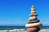 Fototapeta Desenie - Concept of balance and harmony. stones balance on the background