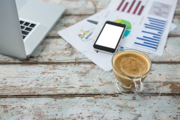 Poster - Cup of coffee with mobile phone, graph and laptop