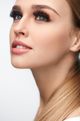 Wall Mural - beauty woman face. beautiful female with makeup, long eyelashes