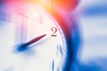 clock time with zoom motion blur focus at 2 o'clock, fast speed business hour concept.