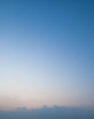 sunset with soft blue sky background